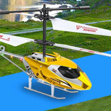 Yellow and black plastic RC helicopter with gyro, metal skids and rotor mast