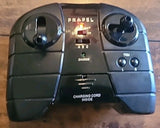 Black electronic remote control with dual thumb sticks and charging cord