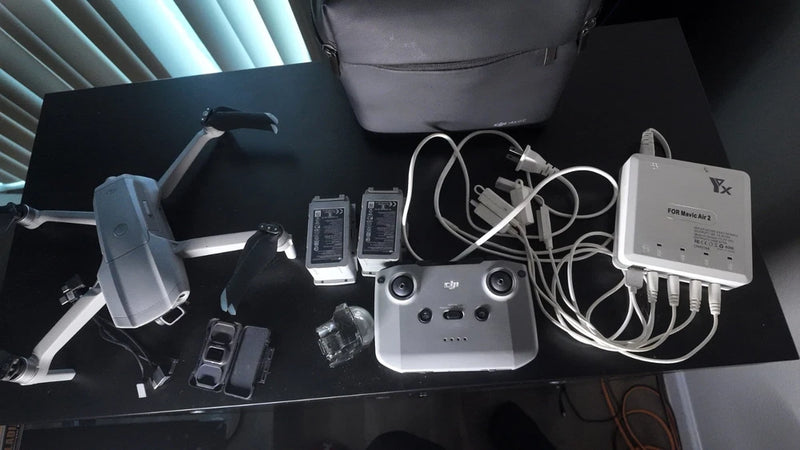 Drone remote controller with batteries, charger, and ND filter set