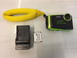 Waterproof digital camera with green body, lens cap, and charger with battery