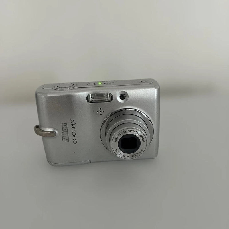 Nikon Silver Compact Digital Camera Easy to Use with Button Layout