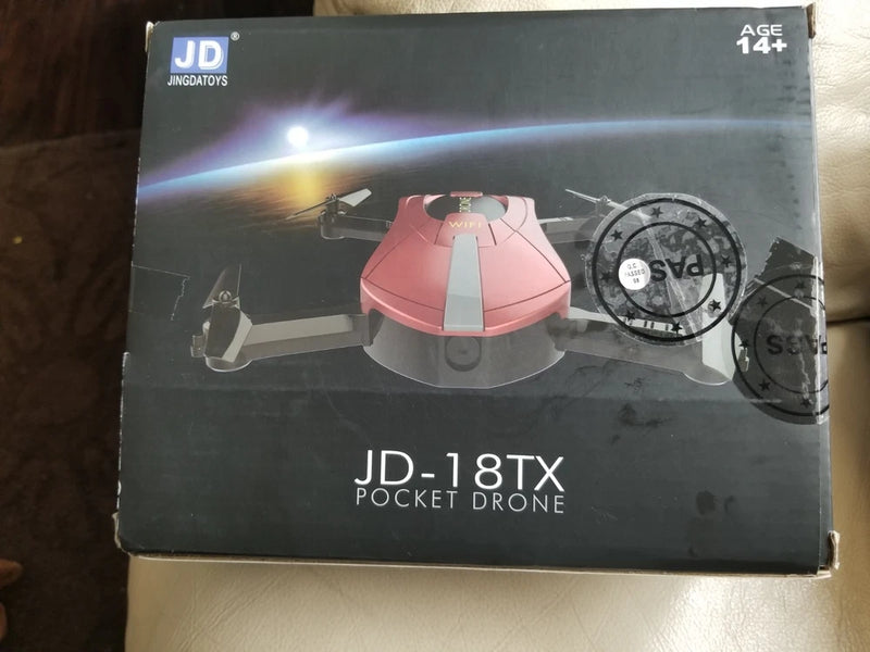 Pocket drone box showing JD-18TX branding and foldable quadcopter design