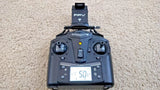 Udi RC drone controller with dual joysticks and digital display, front view