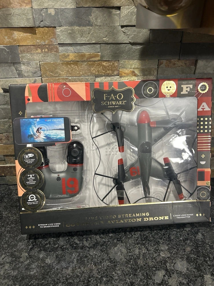FAO Schwarz live video streaming drone kit with controller and display screen