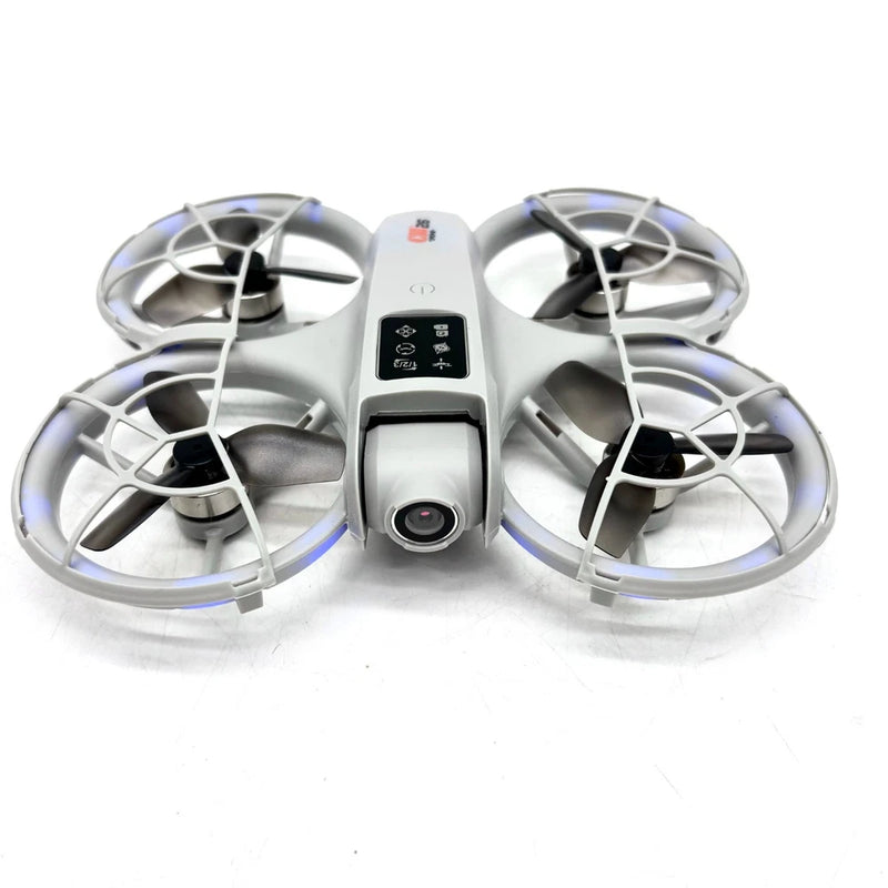 Quadcopter drone with four silver propellers and front camera module, LED accent lights