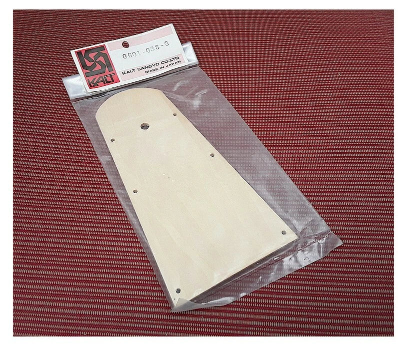 RC helicopter front canopy panel in sealed bag, light wood with screw holes