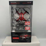 Red palm-sized performance drone in retail box