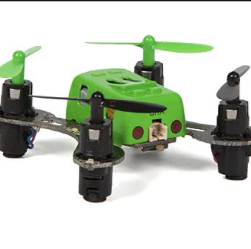 Green mini quadcopter drone with four rotors and black motor housings