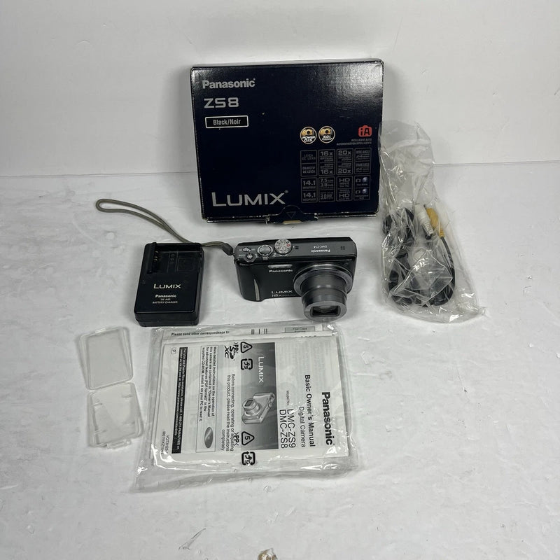Panasonic Lumix DMC-ZS8 Digital Camera +Charger Black ¨C Screen Has Spots - As Is