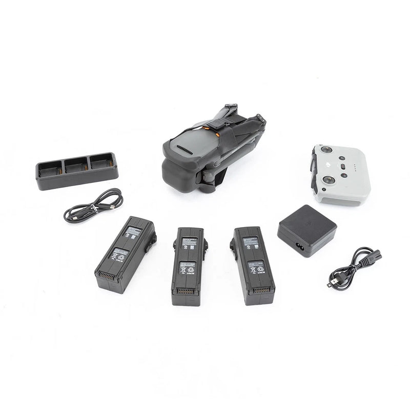 Drone accessory kit with charging hub, multiple batteries, cables, and prop guard