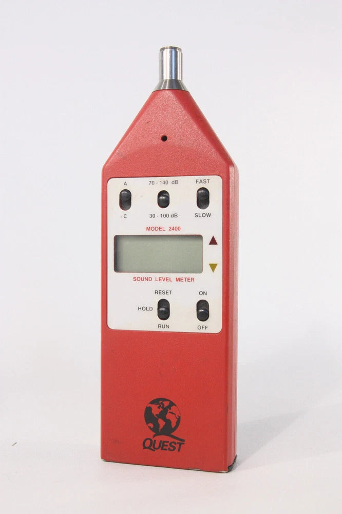 Handheld Quest sound level meter with red body and top probe, digital display and buttons