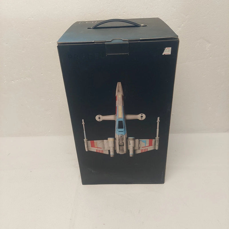 Star Wars X-Wing T-65 propelling battling drone in retail box, top handle visible