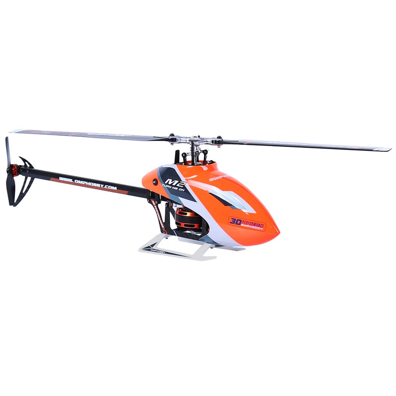 Orange RC helicopter with main and tail rotor blades, canopy and landing skids