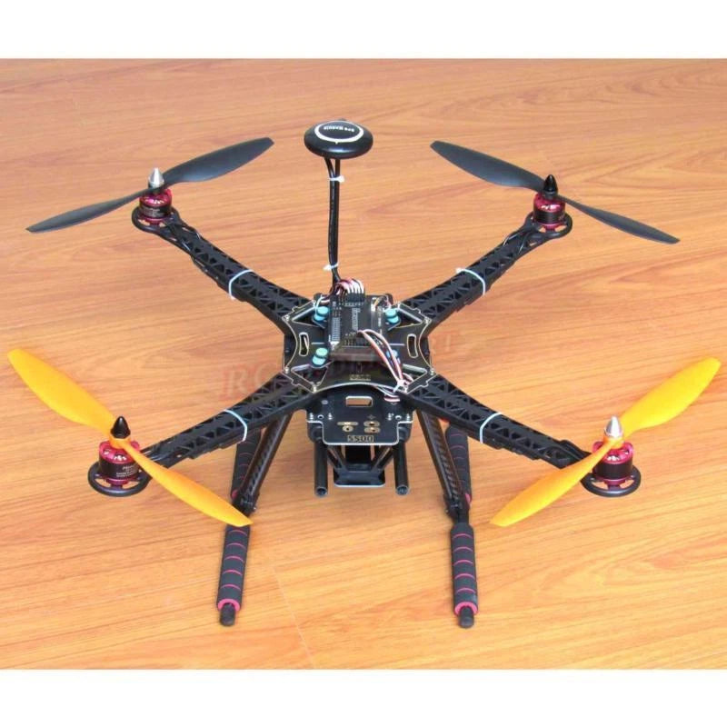 DIY quadcopter drone kit with yellow propellers, carbon frame, GPS module and controller