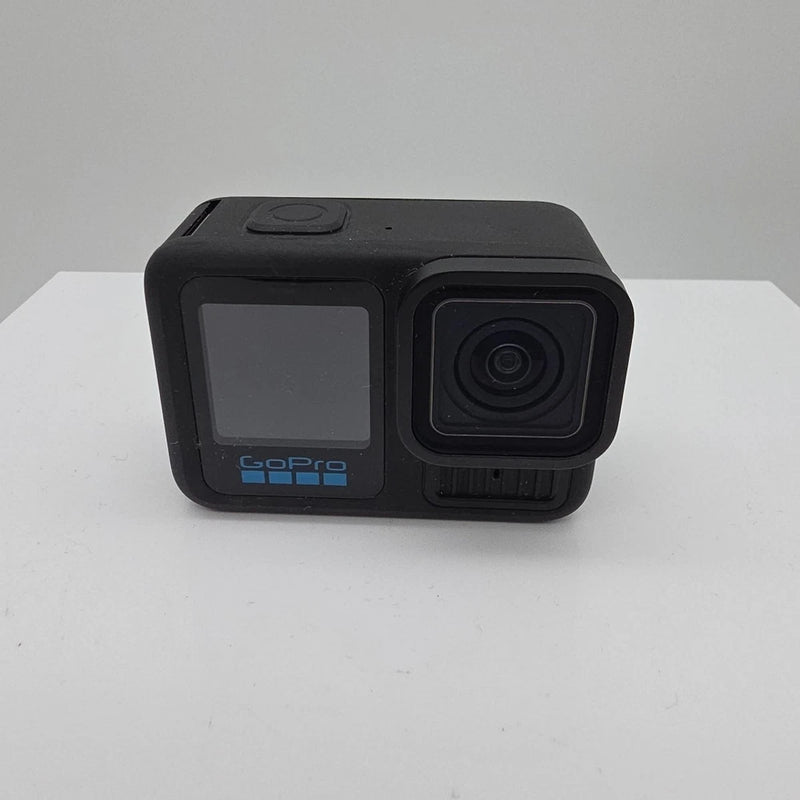 GoPro action camera with front lens and dark LCD screen, black body