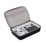 JSVER drone carrying case with molded interior, holding a white quadcopter and controller