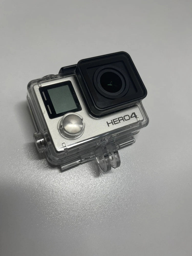 GoPro HERO4 action camera in clear waterproof housing with LCD screen and lens