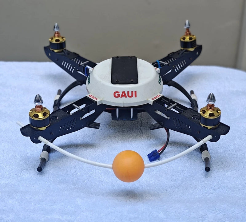 GAUI quad drone project with four motors and central black flight controller