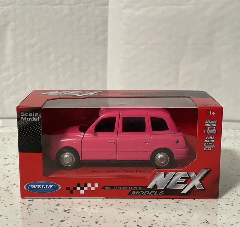 Welly Nex Die Cast Model Of The London Taxi TX4 In Pink. New In Box.