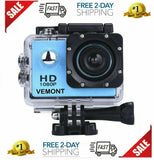 Blue waterproof action camera in clear case with front lens and black mounting bracket