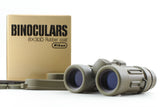 Green waterproof rubber-coated 8x30 binoculars with Nikon box, dual eyepieces