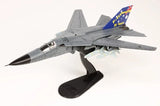 Gray F-111C model aircraft with blue 50th anniversary tail decal on display stand