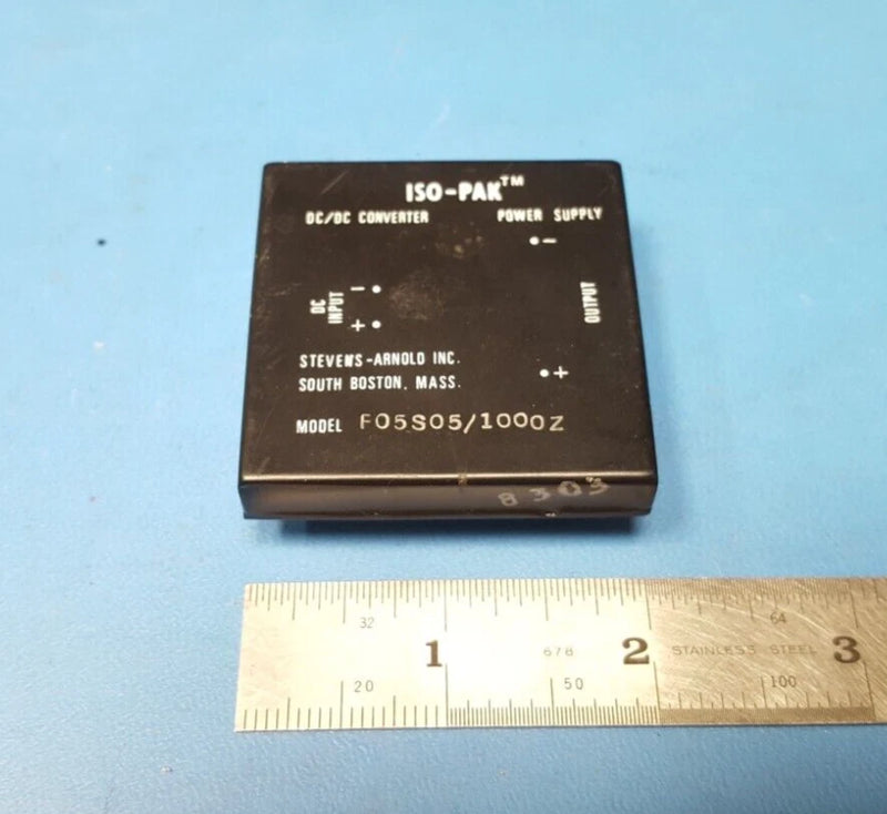 Brown ISO-PAK DC-DC converter module with printed label and terminal pins on top