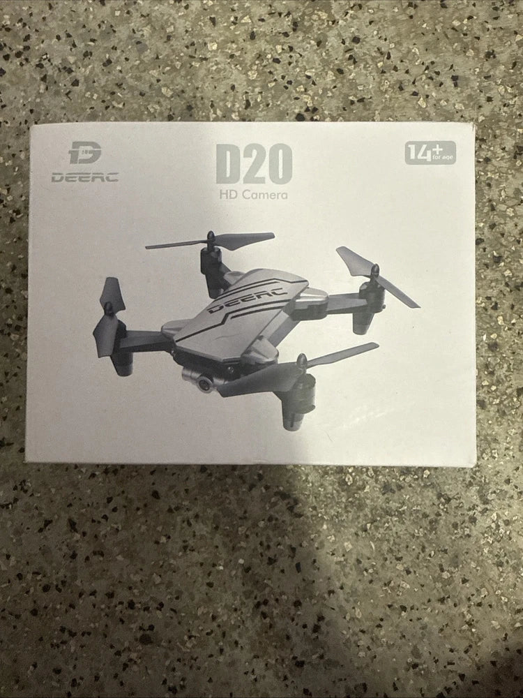 Foldable quadcopter drone toy with HD camera, shown in retail box