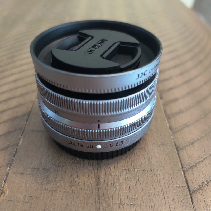 Nikon NIKKOR Z DX 16-50mm f/3.5-6.3 VR Lens (Silver) w/ Lens Hood Included