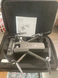 Used PHoeniX DRC-LSX10 drone in carrying case with folded propellers