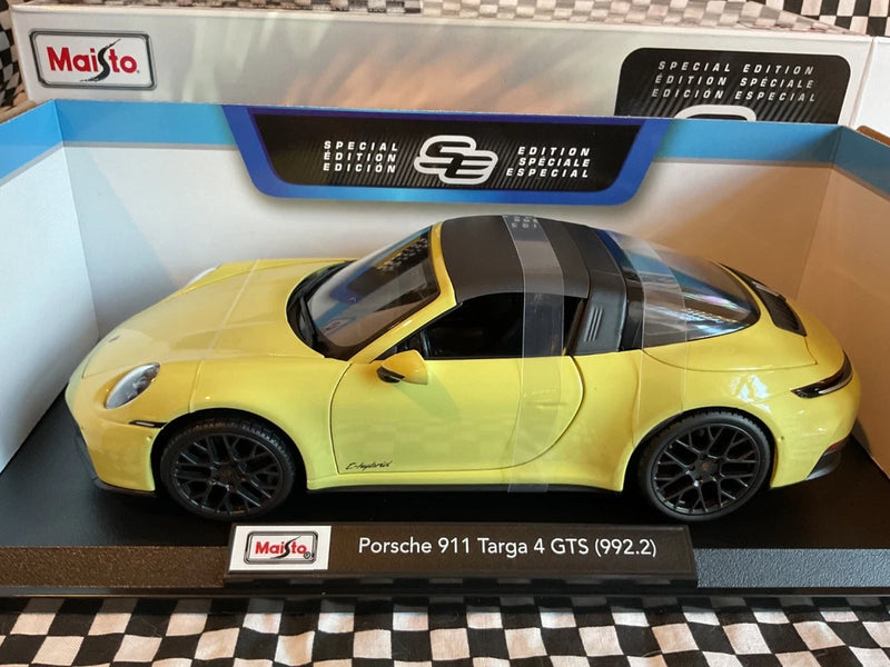 Yellow Porsche 911 Targa 4 GTS die-cast model car, black wheels and roof