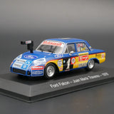 Blue Ford Falcon race car model, detailed front grille and white tires