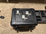 GoPro action camera bundle with open hard case and mounted cameras on tray