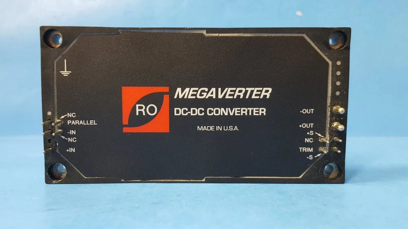Black MEGAVERTER DC-DC converter with orange logo and labeled input/output terminal panel