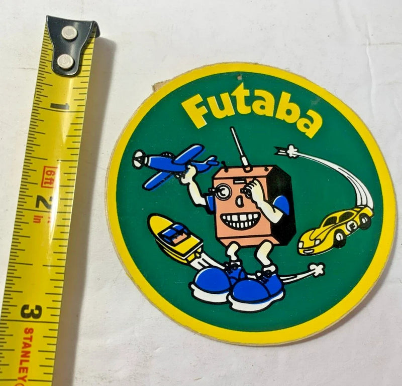Vintage Futaba RC logo sticker, round green with yellow border and Futaba text