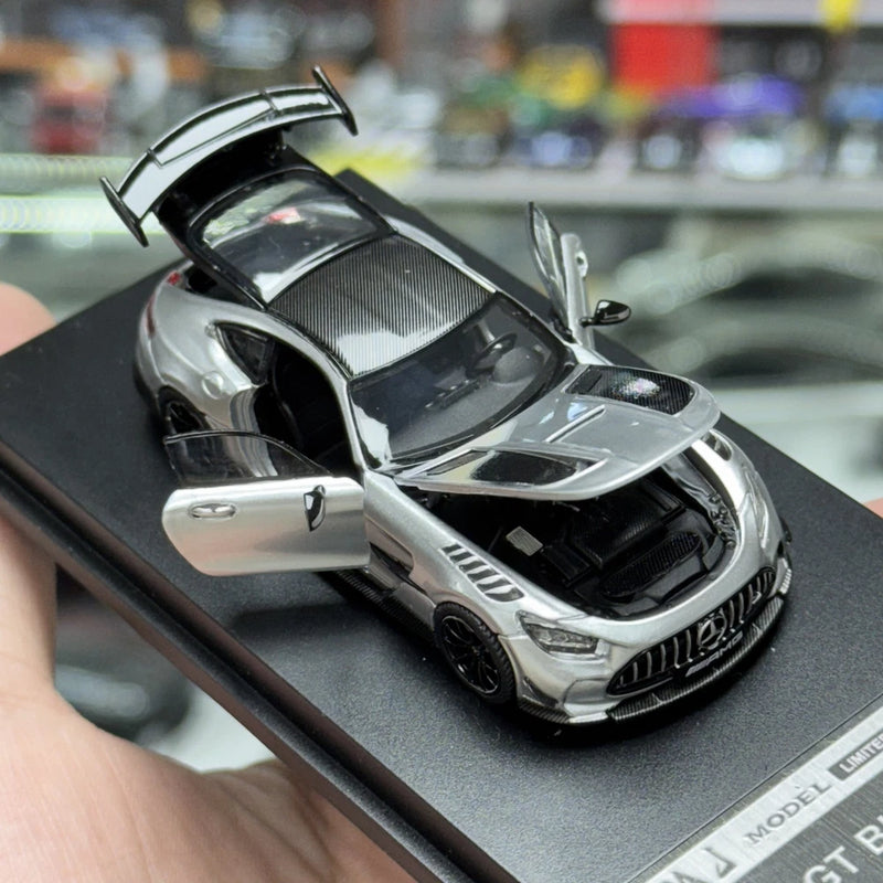 Black alloy model car with full opening parts, front hood and doors open