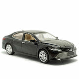 Black 1:34 scale diecast model car with opening doors and detailed headlights