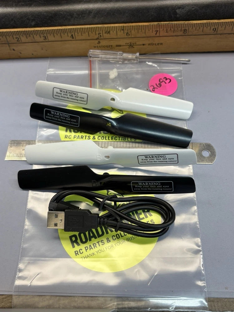 RC DRONE PARTS LOT / PROPELLER SET AND CHARGER