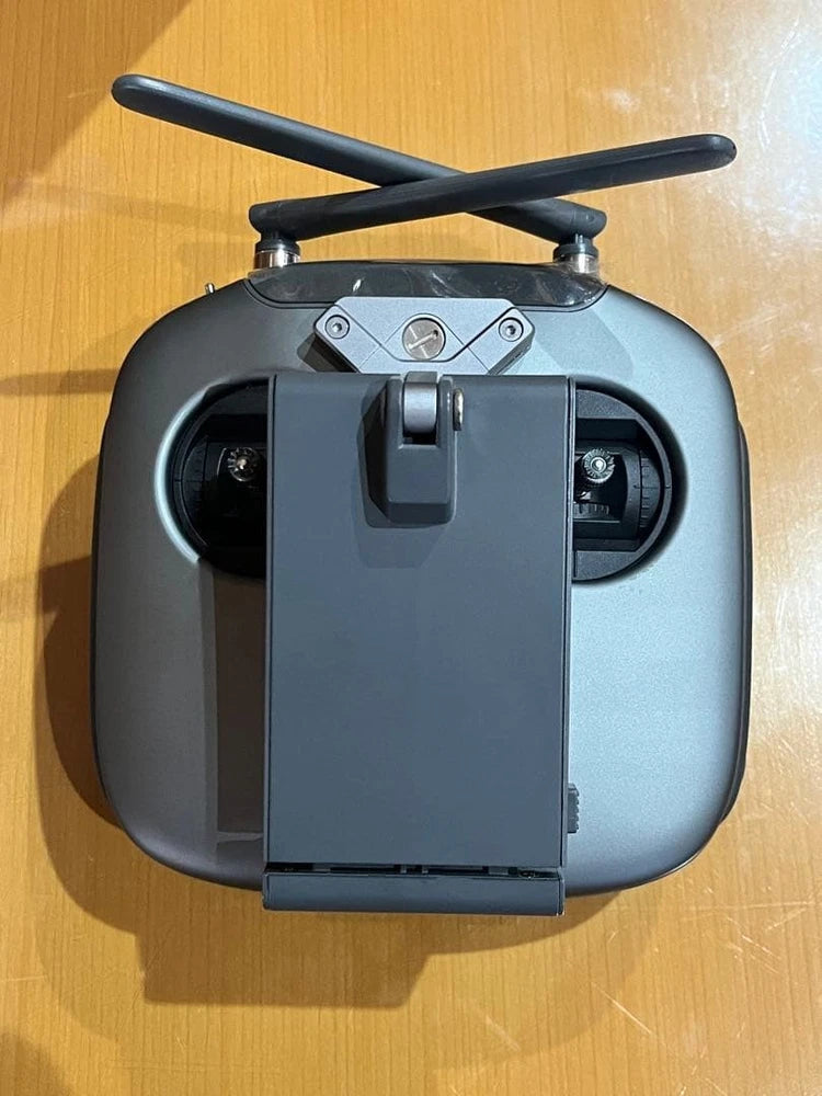 DJI drone remote controller transmitter with dual antennas and phone mount