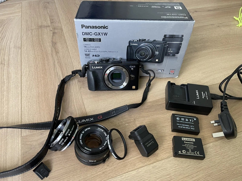 PANASONIC LUMIX GX1 with Canon FD 1.8 lens - JUST 3641 SHOTS - very good