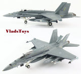 Grey fighter jet model aircraft with landing gear, open nose and swept wings
