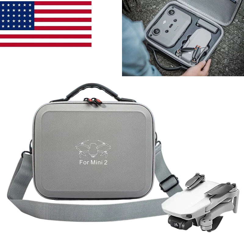 Gray zippered drone storage case with carry handle and shoulder strap, molded compartments