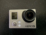 GoPro HERO3 action camera with front lens and display, silver body, buttons