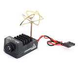 Black FPV AIO camera with lens, heatsink top, twin antenna, red/black power lead