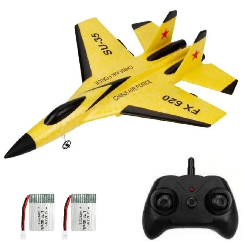 Yellow RC glider jet plane with remote controller, plus two battery packs