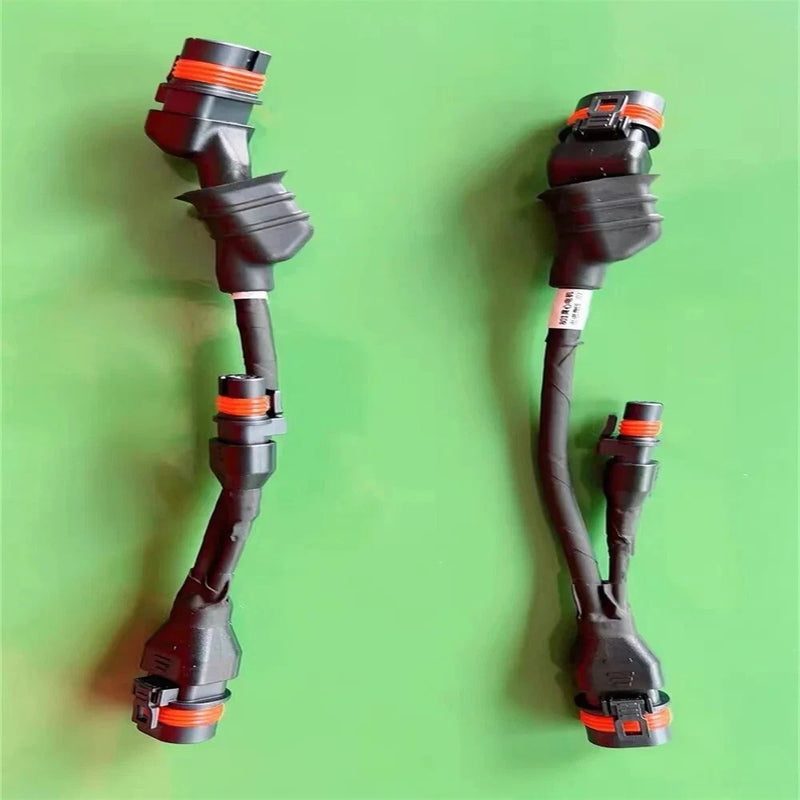 Nozzle adapter cable assembly with orange connector fittings, gray braided housing