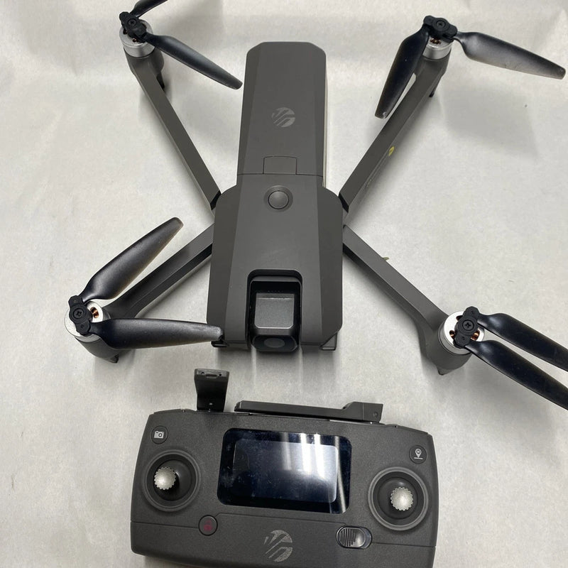 Foldable HD camera drone with remote controller, gray body and black propeller arms