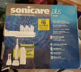 Sonicare Plus model battery powered sonic toothbrush retail box with three brush heads
