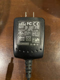 Adapter A10P1-05MP.  Input: 100-240v~0.3A,47-63Hz.  Output:  5V