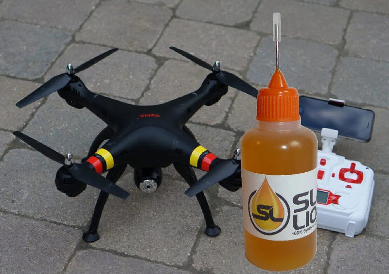 Synthetic liquid lube oil bottle with orange dropper cap
